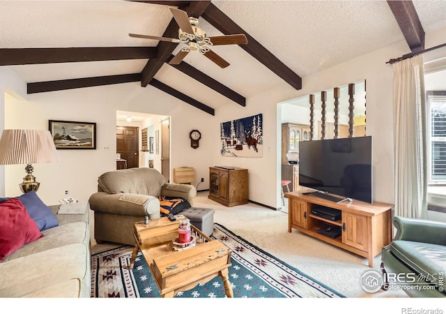 living area featuring carpet flooring, vaulted ceiling with beams, a textured ceiling, and ceiling fan