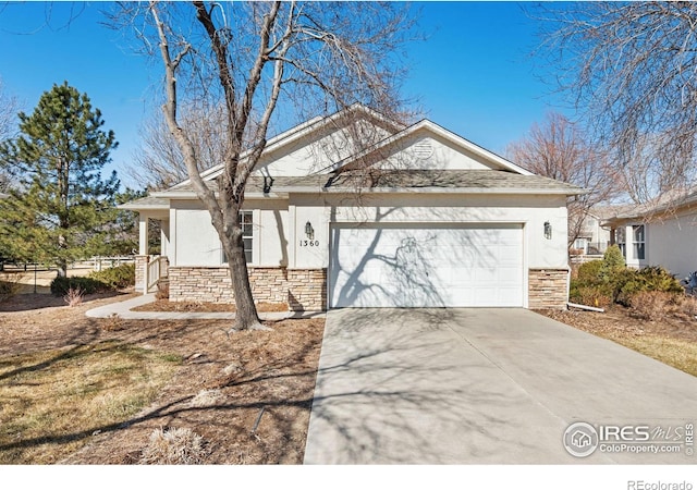 ranch-style house with a garage, stone siding, concrete driveway, and stucco siding