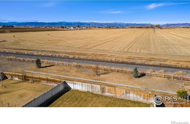 aerial view featuring a rural view and a mountain view