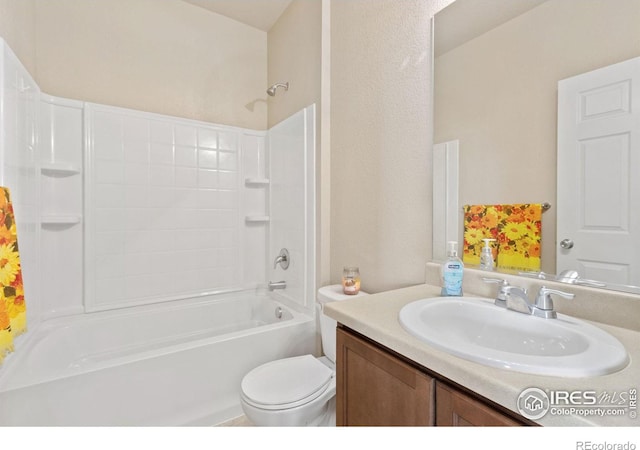 full bath with toilet, vanity, and shower / tub combination