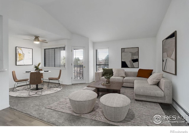 living room with lofted ceiling, a ceiling fan, baseboard heating, and wood finished floors