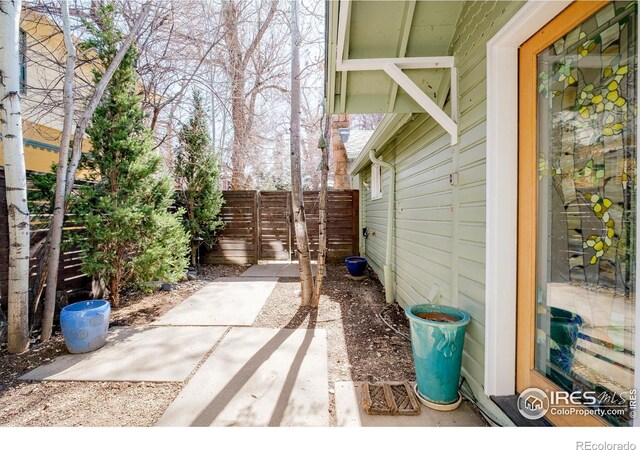 view of patio / terrace featuring fence