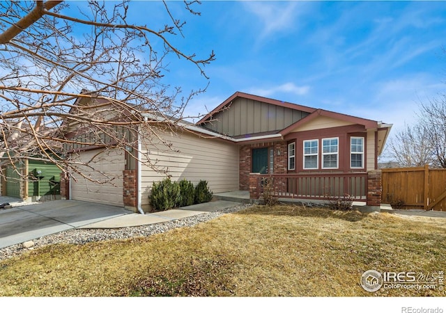 ranch-style house featuring brick siding, board and batten siding, fence, concrete driveway, and a garage