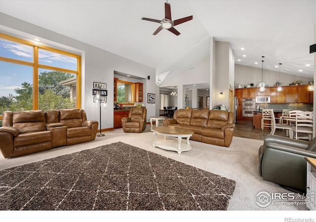 living area featuring ceiling fan, high vaulted ceiling, carpet flooring, and recessed lighting