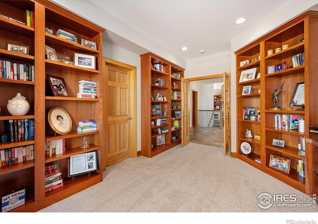 39658 Ridge Park Dr, Severance, CO 80610 - living area with an upstairs landing, carpet flooring, and recessed lighting