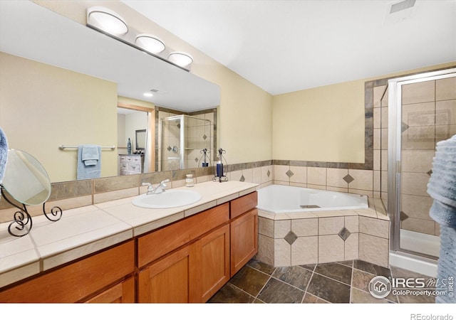 39658 Ridge Park Dr, Severance, CO 80610 - bathroom with a shower stall, vanity, and a bath