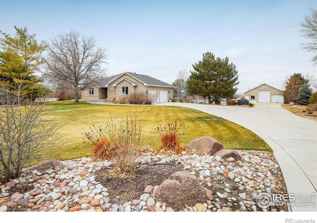 ranch-style home featuring a front yard