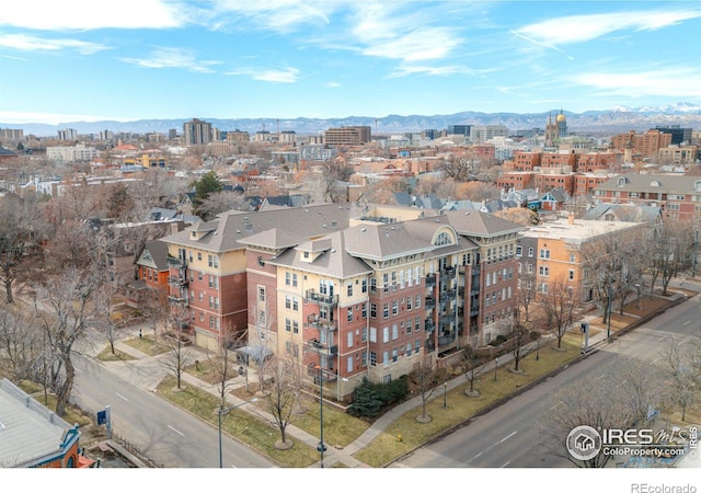 drone / aerial view with a view of city and a mountain view