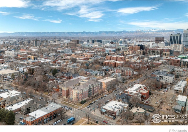 drone / aerial view with a city view and a mountain view