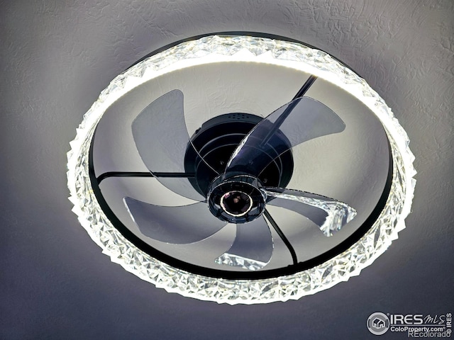 interior details featuring a ceiling fan