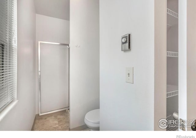 3565 Windmill Dr Unit 5, Fort Collins, CO 80526 - bathroom with toilet and baseboards