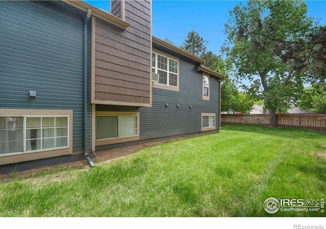 3565 Windmill Dr Unit 5, Fort Collins, CO 80526 - rear view of property with a chimney