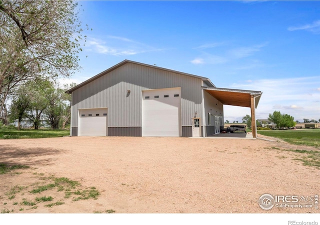 36340 County Road 49, Eaton, CO 80615 - view of property exterior featuring a garage and an outdoor structure