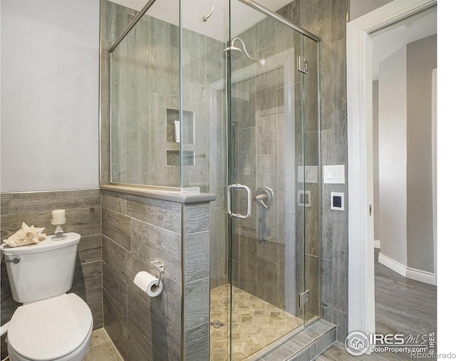 36340 County Road 49, Eaton, CO 80615 - bathroom with a stall shower and wainscoting