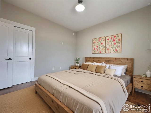 bedroom with wood finished floors