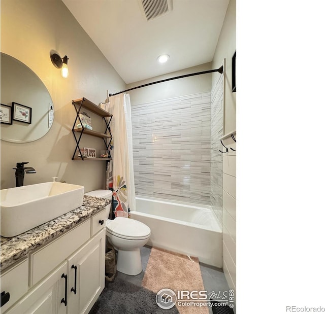 full bath featuring toilet, visible vents, shower / tub combo with curtain, and vanity