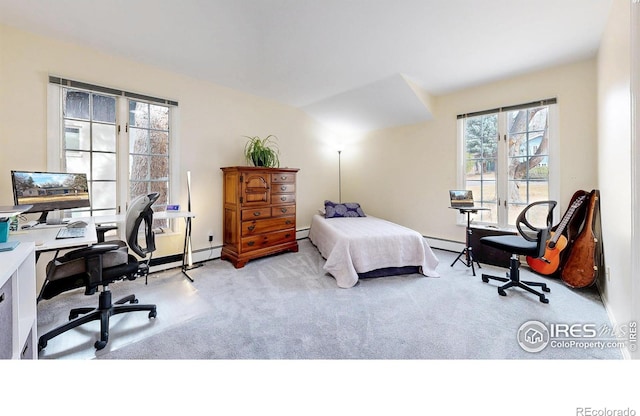 carpeted bedroom featuring a baseboard radiator