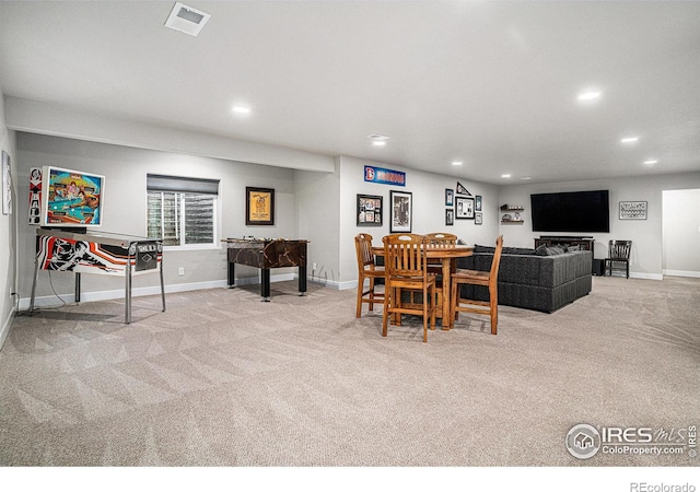 dining area with baseboards, carpet floors, visible vents, and recessed lighting