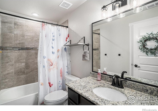 bathroom featuring toilet, shower / bath combo, visible vents, and vanity