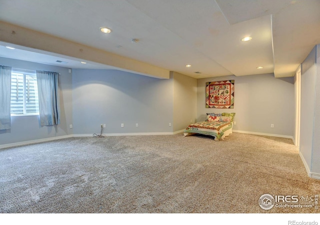 unfurnished room featuring visible vents, recessed lighting, baseboards, and carpet