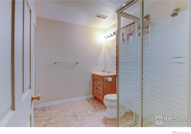 full bathroom with visible vents, a stall shower, vanity, and baseboards