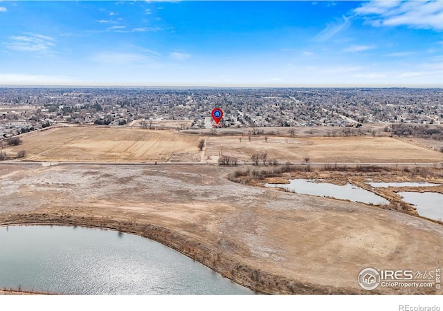 drone / aerial view featuring a water view