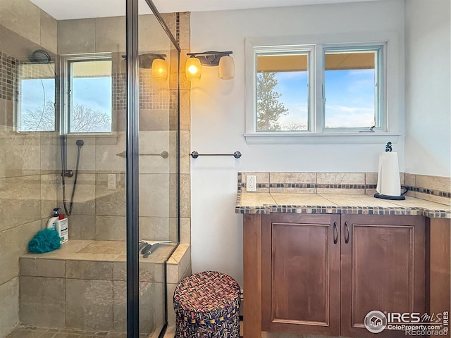 full bathroom featuring a shower stall