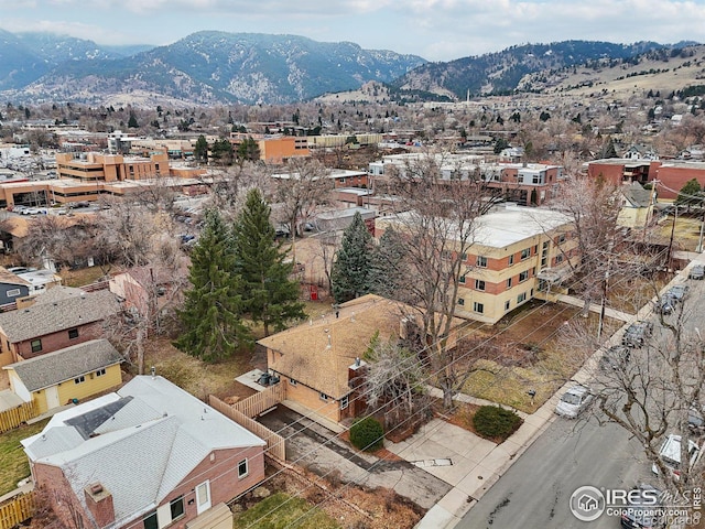 drone / aerial view featuring a mountain view