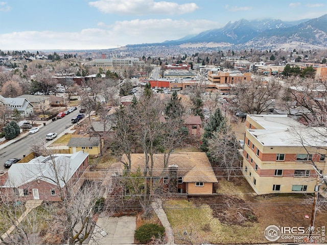 drone / aerial view featuring a mountain view