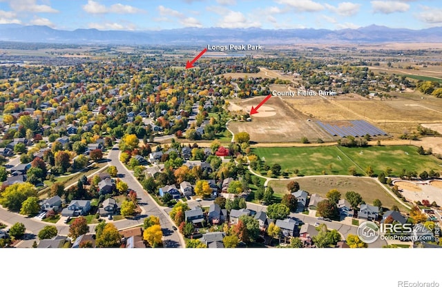 aerial view featuring a residential view and a mountain view