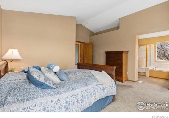 bedroom featuring lofted ceiling, baseboards, and carpet floors