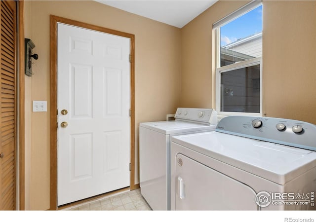 laundry area featuring laundry area and separate washer and dryer