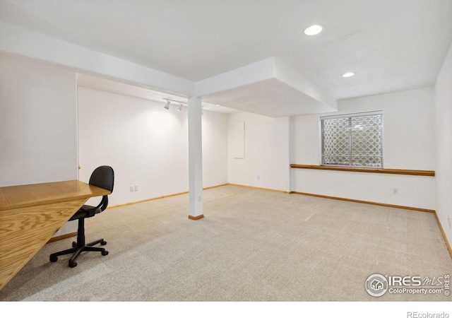 unfurnished office featuring recessed lighting, carpet, and baseboards