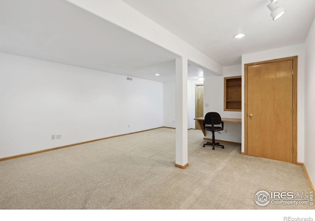 unfurnished office with carpet, visible vents, baseboards, and recessed lighting