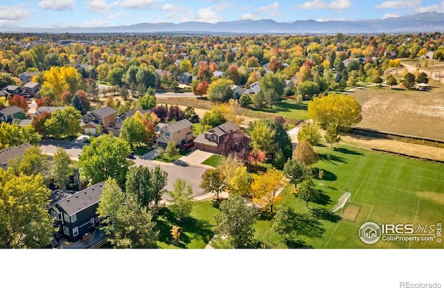 bird's eye view featuring a residential view and a mountain view