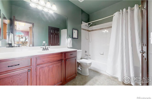 bathroom with toilet, vanity, and shower / tub combo with curtain