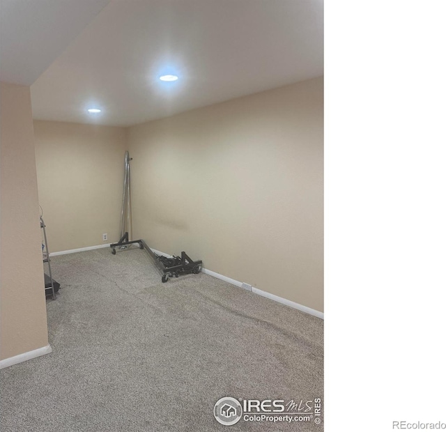 interior space featuring recessed lighting and baseboards