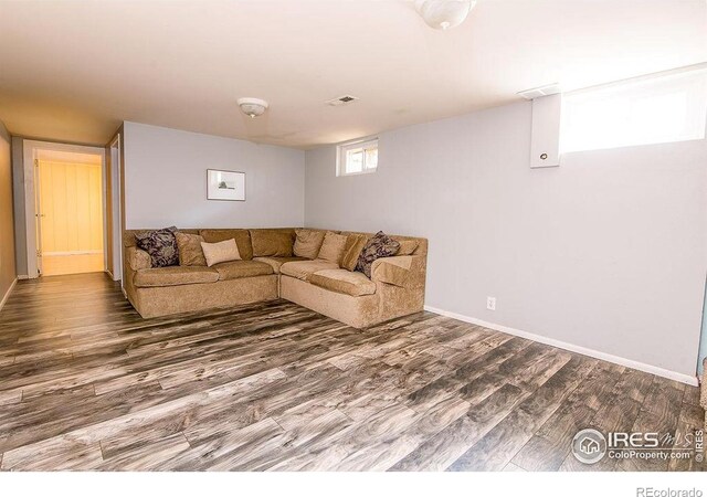 410 Cottonwood Ave, Eaton, CO 80615 - living area with wood finished floors and baseboards