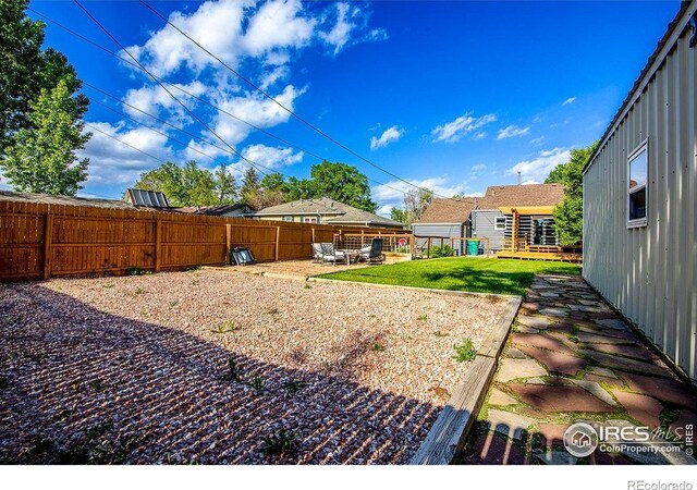 410 Cottonwood Ave, Eaton, CO 80615 - view of yard featuring a patio