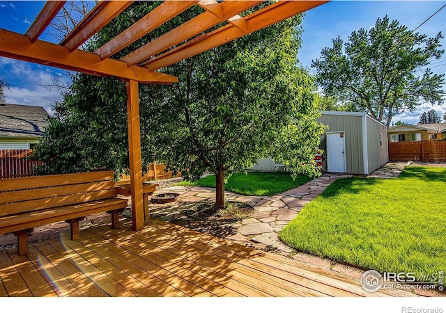 410 Cottonwood Ave, Eaton, CO 80615 - wooden deck featuring an outdoor fire pit and a pergola