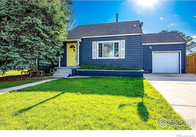 410 Cottonwood Ave, Eaton, CO 80615 - bungalow-style home featuring a garage, a front lawn, concrete driveway, and a shingled roof