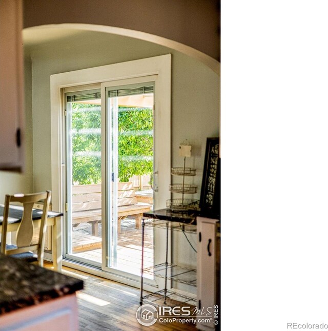 410 Cottonwood Ave, Eaton, CO 80615 - doorway featuring arched walkways and wood finished floors