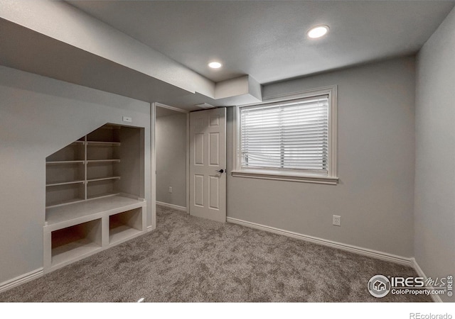 interior space featuring carpet, baseboards, and recessed lighting