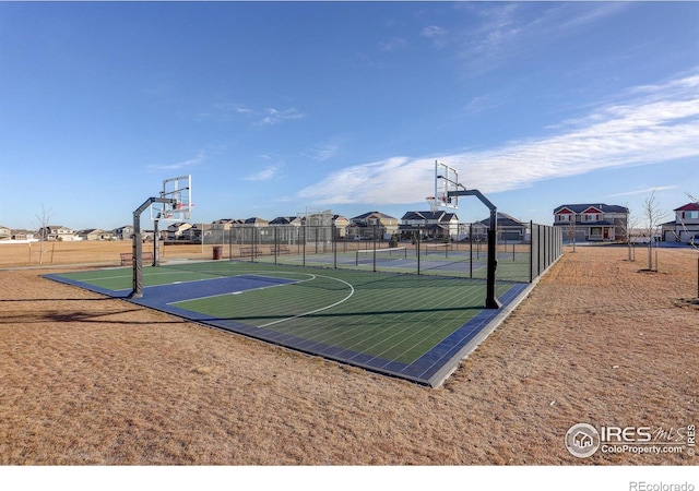 view of sport court featuring community basketball court and fence