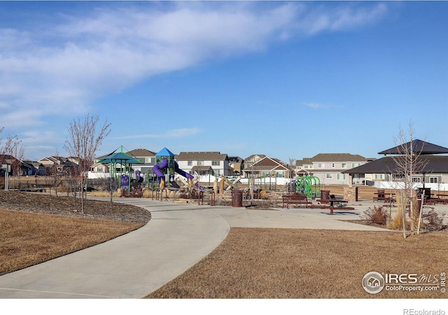 community jungle gym featuring a residential view