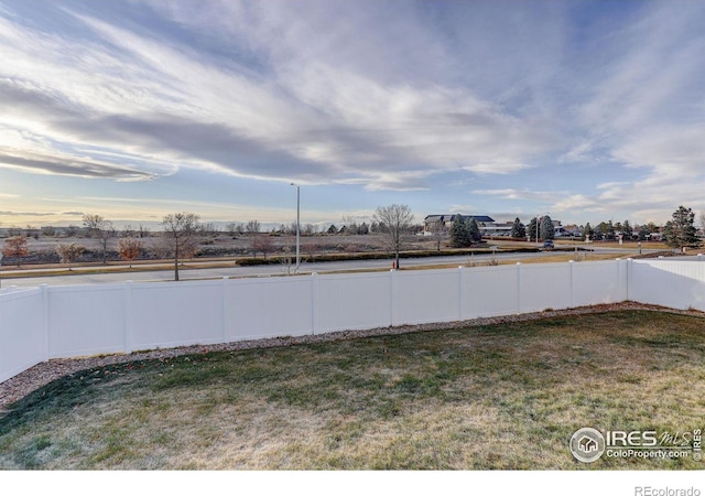 view of yard featuring fence