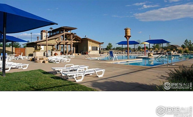 community pool with a patio