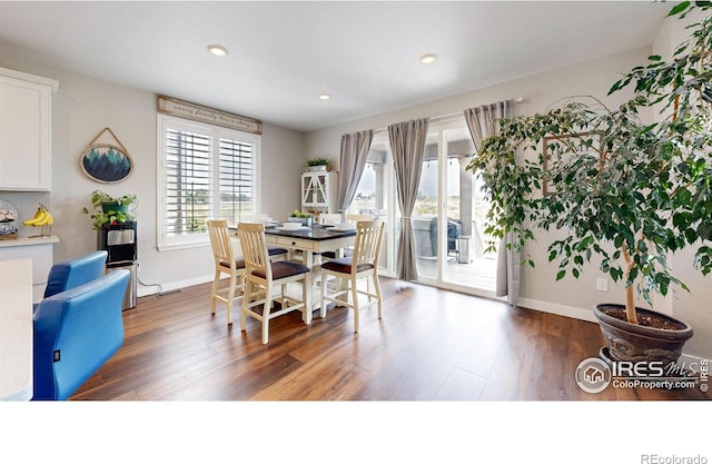 890 Meadowlark Dr, Erie, CO 80516 - dining room with recessed lighting, baseboards, and wood finished floors