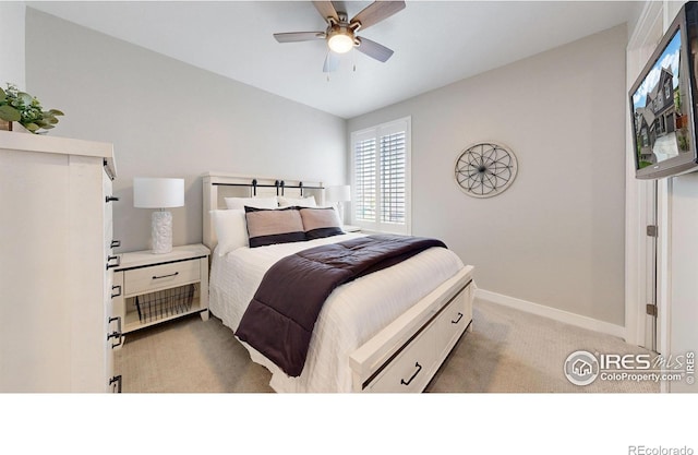 890 Meadowlark Dr, Erie, CO 80516 - bedroom with baseboards, light colored carpet, lofted ceiling, and ceiling fan