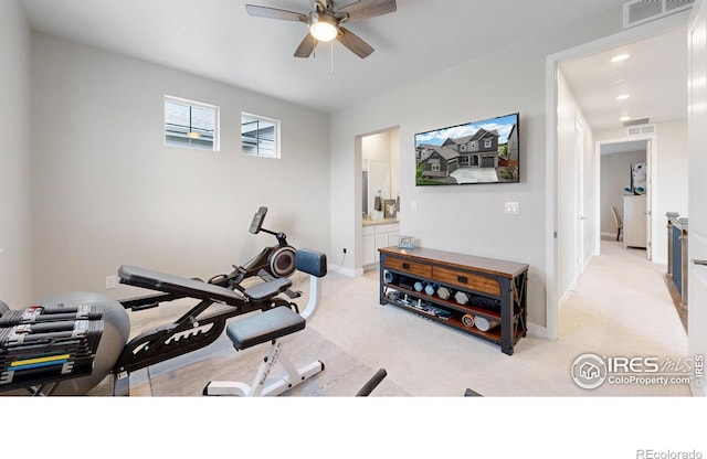 890 Meadowlark Dr, Erie, CO 80516 - exercise area featuring a ceiling fan, baseboards, visible vents, and light carpet